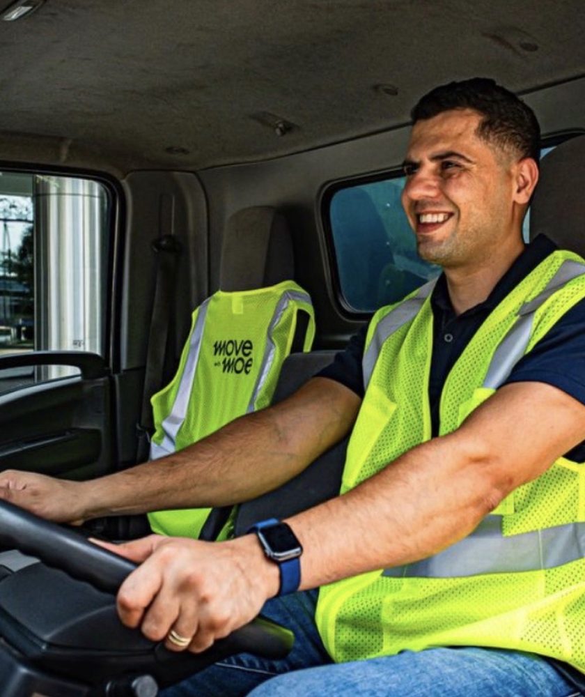 Moe behind the wheel of the Move with Moe truck