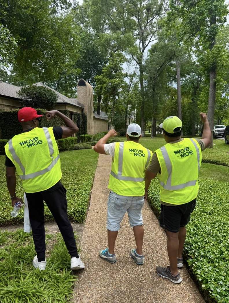 Three movers walking to the job together