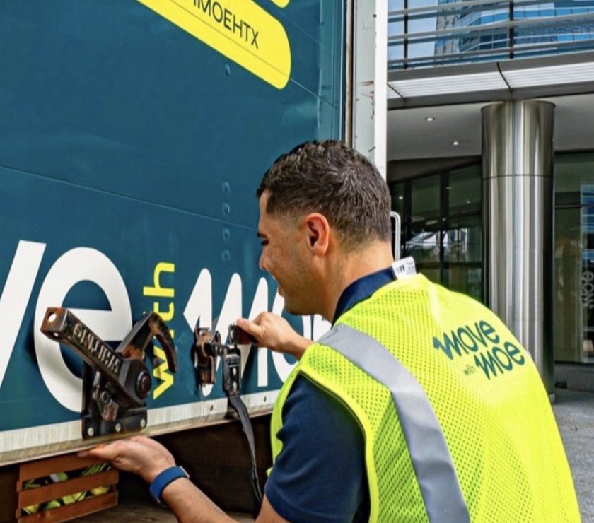 Moe strapping a load inside the truck